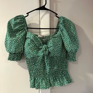 Red and green blouse with small floral print. Size small. Made in Italy